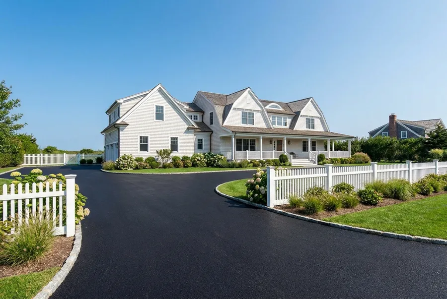 New asphalt circular driveway at a Hamptons style home